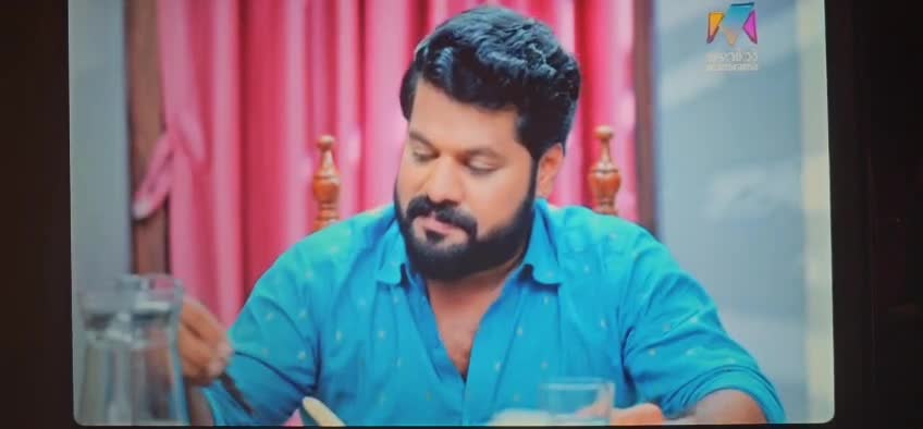 Rahul performing in a Malayalam television scene